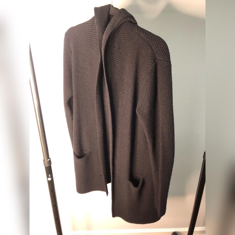 Sleek black hooded sweater